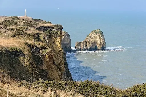 Eisenhower visiting Pointe du Hoc after capture